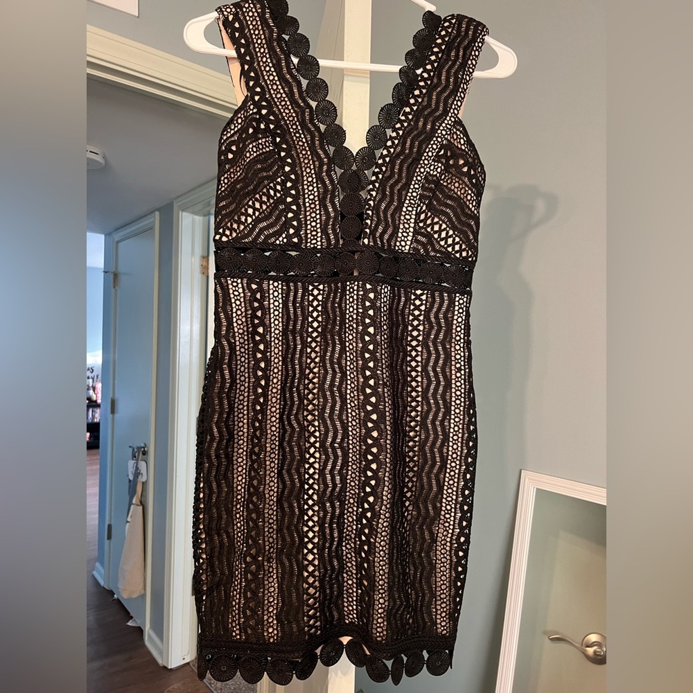 Black and nude boutique mini dress